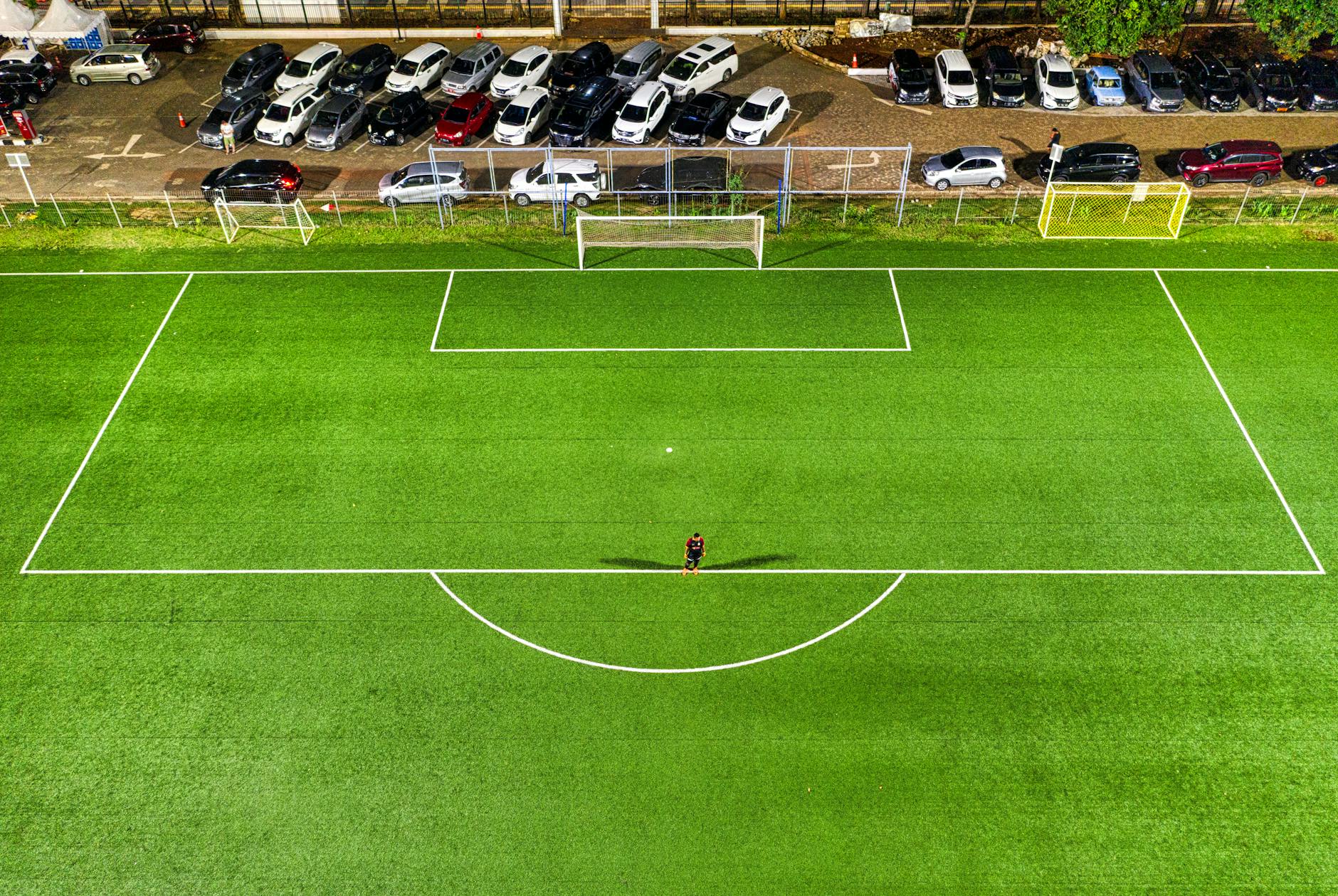 aerial photography of football field goal net